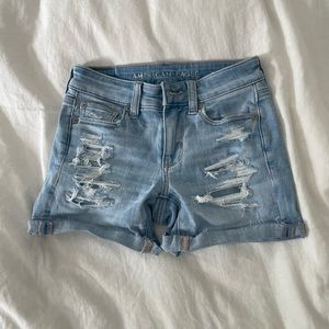 I am selling a new unworn pair of size 000 jean shorts from American Eagle.